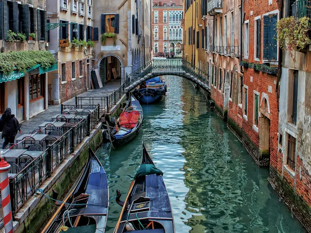 Canal running between historic waterside buildings